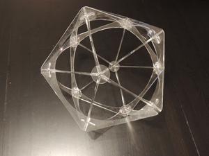 An acrylic frame of transparent acrylic in the shape of an icosahedron